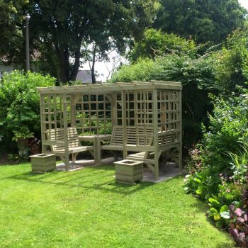 The Riviera Seated Pergola, wooden garden corner arbour seat with table and trellis – Assembly included